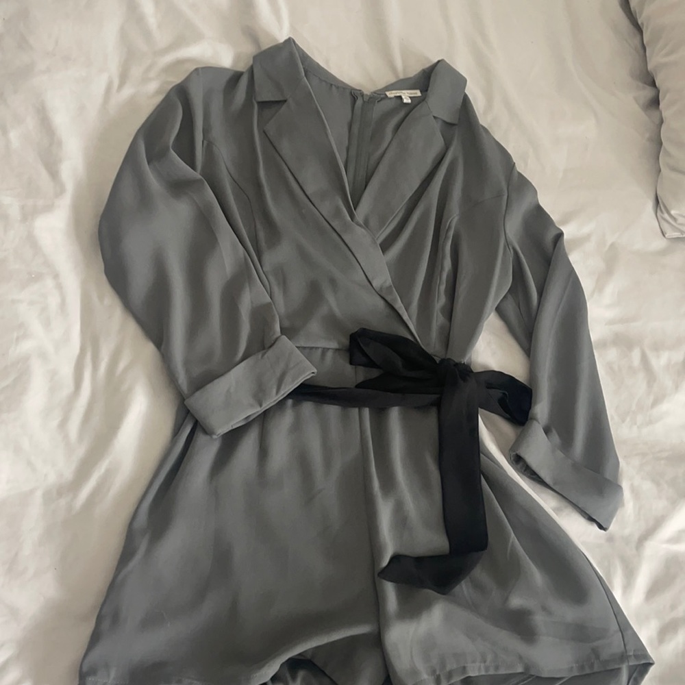 Dark Green Long sleeve romper. Black belt. Charlotte Russe Size M.